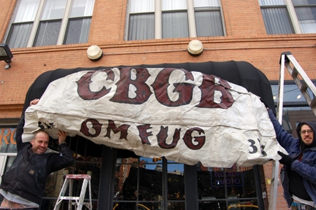 Drew Bushong and Josh Lozano, with the CBGB awning, in 2016. Photo by Ranier Turim