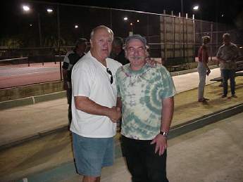 Bill Arnoldi of 1st Place Virtus (Green))and Warner Carlisle of 2nd Place Bocce Questo shake hands.